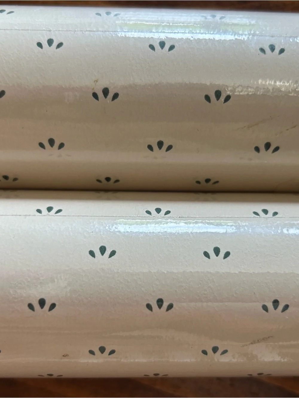 Two rolls of vintage wallpaper cream and dark green